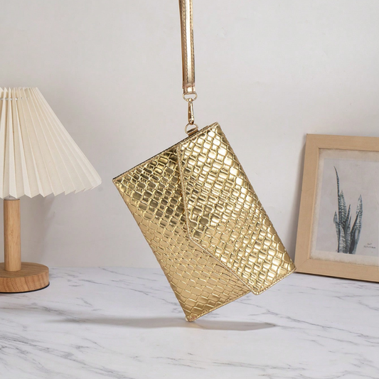 Bolso de mano Clutch Dorado Goldie