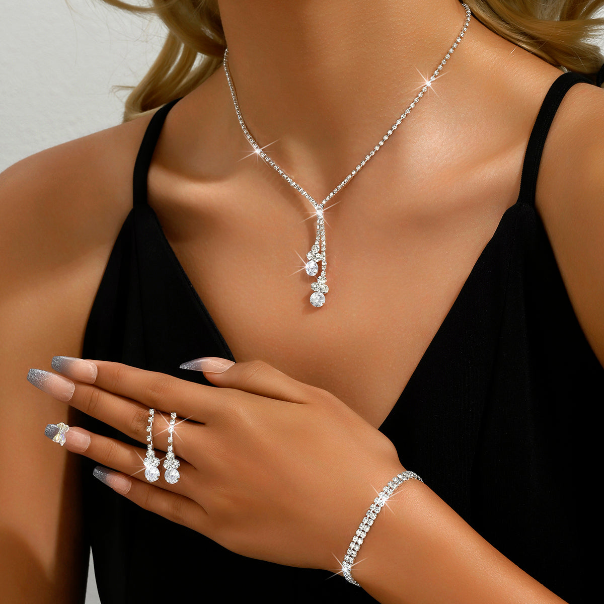Set de Collar Aretes y Pulsera Evania - Plateado